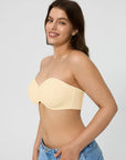 Popilush? beige strapless push-up bra on a smiling model, ideal for shapewear dresses, offering support and shaping.