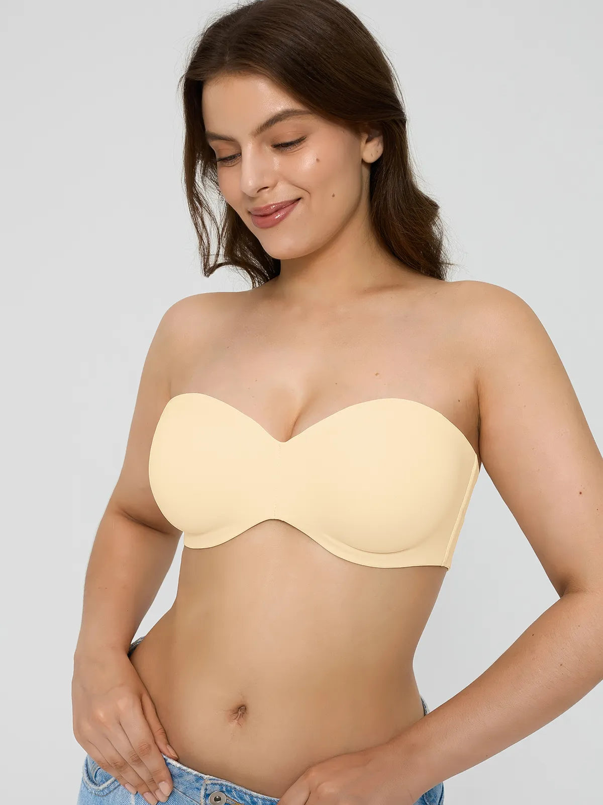Popilush? Beige Strapless Push-Up Bra: Model wearing seamless shapewear, ideal for shapewear dresses and support.
